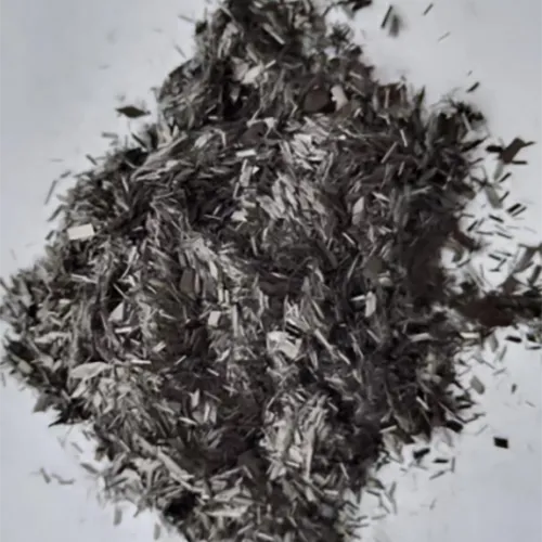 chopped carbon fiber strands grey background